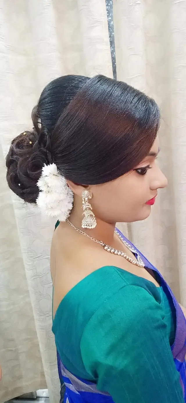 Hair styling by Deblina's Makeover